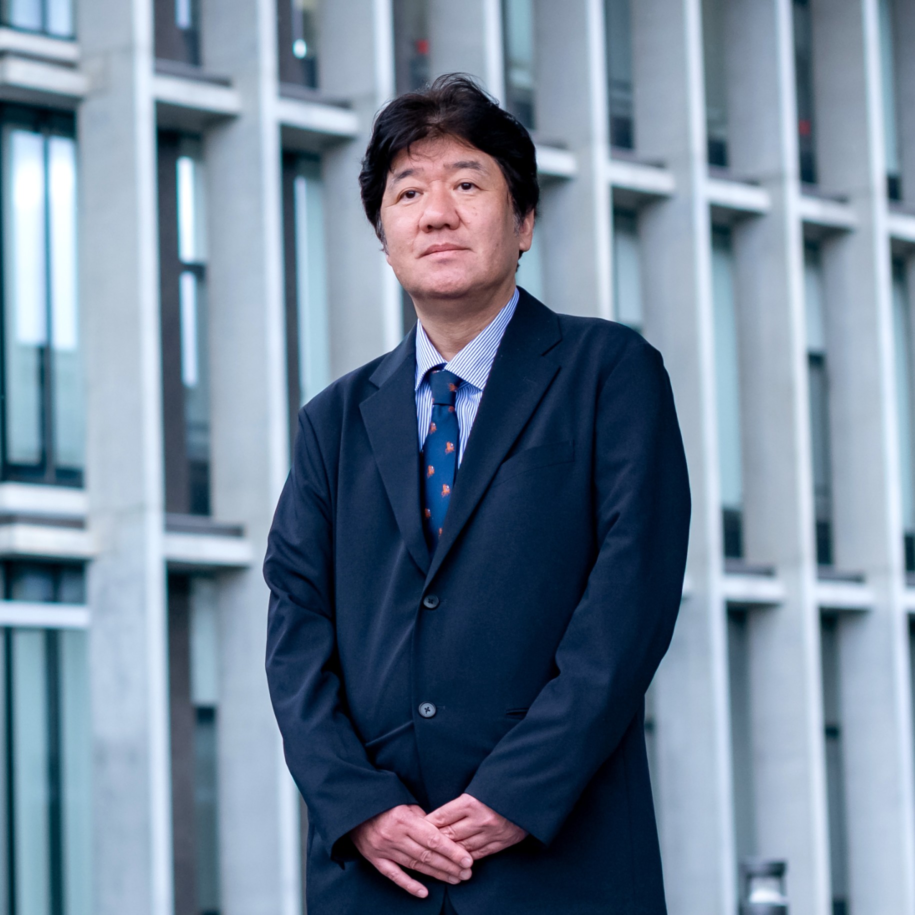 学長塚本康浩